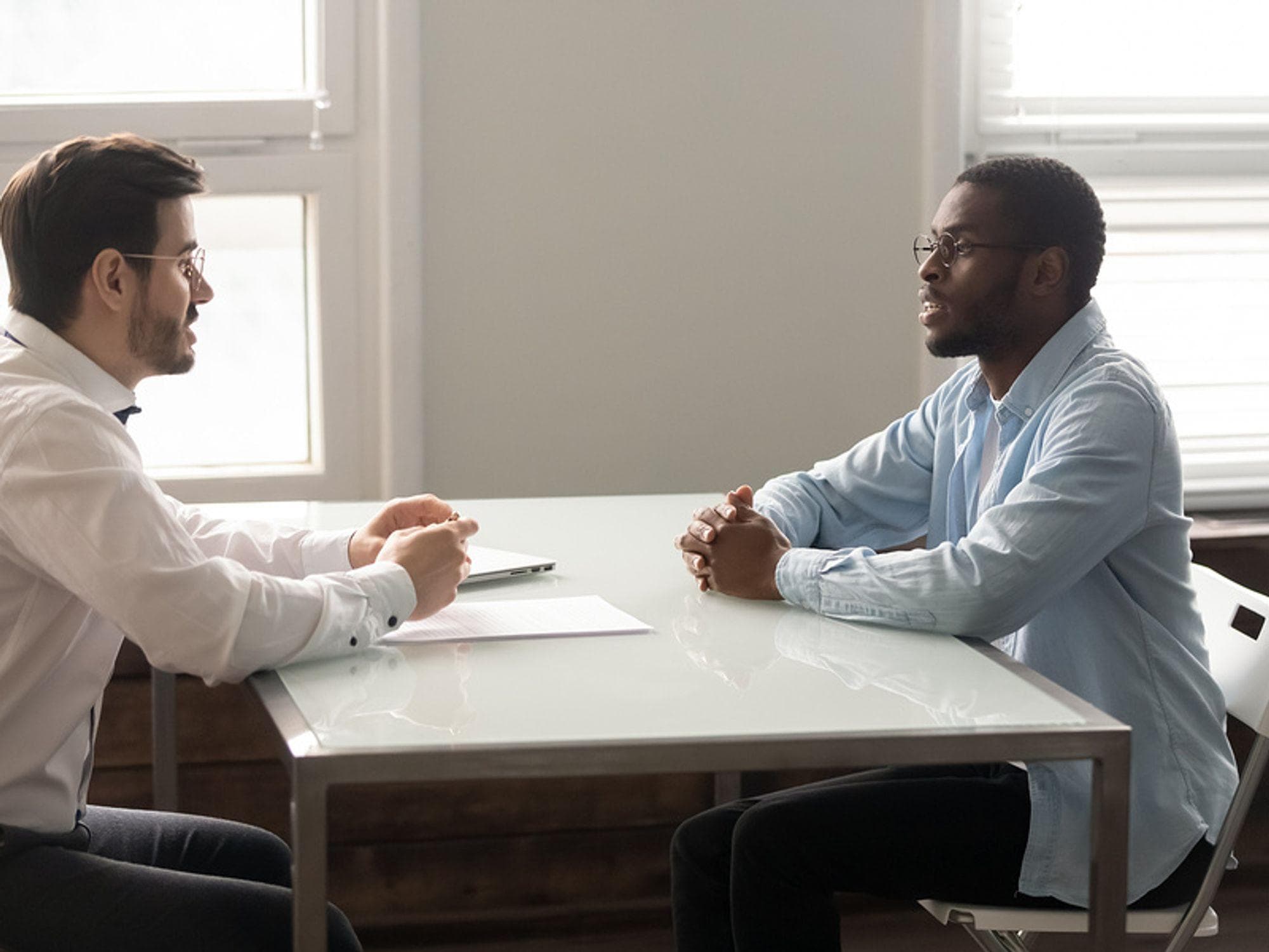 Professional interview discussion between a candidate and hiring team