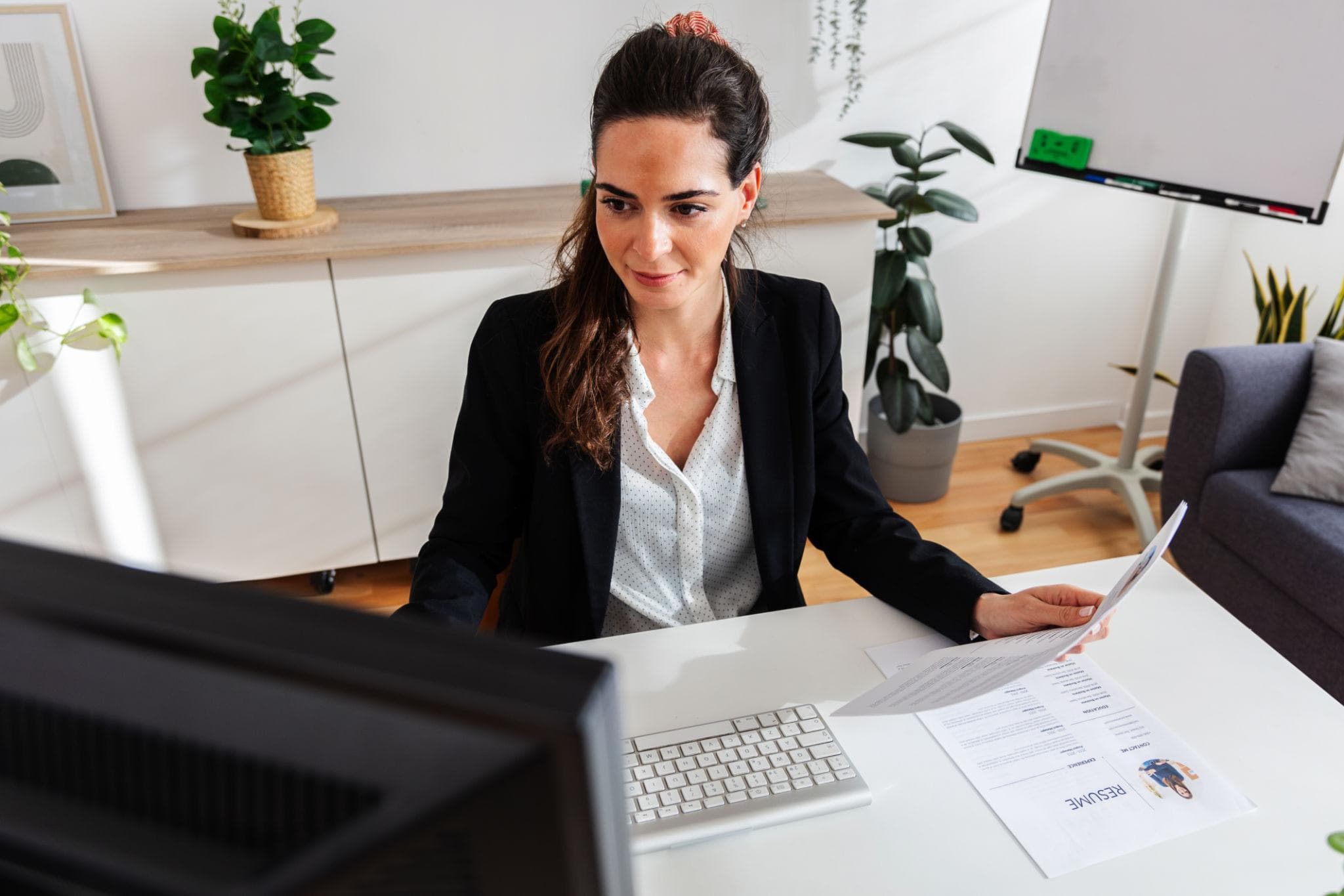 Recruiter reviewing candidate profiles during the screening stage